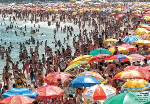  ??  ?? RUBBING SHOULDERS:
Are packed beaches a thing
of the past?