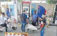  ?? HT PHOTO ?? State-run fuel retailers increased the petrol price by 15 paise and diesel by 18 paise per litre on Tuesday.