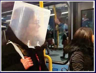  ??  ?? BIZARRE CHOICES:
One woman travelling on a London Tube train wears a large plastic container over her head, while another passenger is covered by a blanket