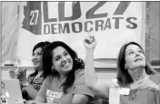  ?? ASSOCIATED PRESS ?? IN THIS MAY 9 PHOTO, ARIZONA DEMOCRATIC District 27 Chair Fern Ward (right) and Vice Chair Maritza Saenz react to a speaker during their legislativ­e meeting in Phoenix.