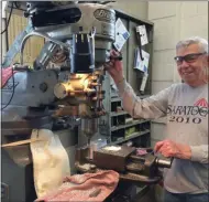  ?? GLENN GRIFFITH - DIGITAL FIRST MEDIA FILE ?? Milling machine operator Tony Orologio Sr. in his element at Ushers Machine and Tool Company in Round Lake where he has worked for 70 years.