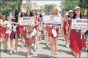  ?? HT FILE ?? District administra­tion roped in foreign models to stage a catwalk with placards asking people to save girl child in April this year.