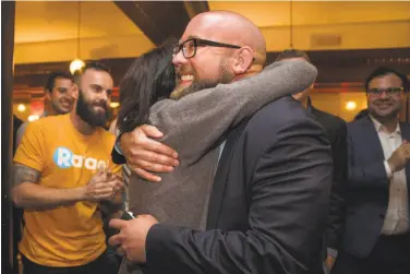  ?? Jana Asenbrenne­rova / Special to The Chronicle ?? Rafael Mandelman gets an election-night hug from Supervisor Hillary Ronen at Cafe du Nord. Mandelman defeated incumbent Jeff Sheehy in District Eight and has vowed to work on homelessne­ss in the city.