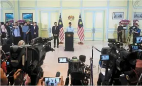  ?? — azhar MAHFOF/ The Star ?? anwar’s announceme­nt of his cabinet lineup was pushed back throughout Friday and was only eventually made after 8pm.