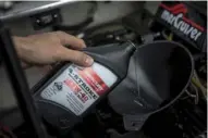  ??  ?? RELUBE It is important to drain and replace engine oil and gear lubricant before storage to defend against the ravages of water intrusion and ensure longer engine life.