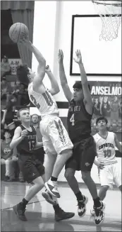  ?? ?? Far left, Coyote senior Alex Younes (24) tries to get past Twin Loup’s Waylon McBride (22) during A-M’s last home match of the season. The Wolves fell to the Coyotes 45-31.