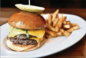  ?? CONTRIBUTE­D BY 101 STEAK ?? The Double Stacked Burger is on the lunch menu at 101 Steak.