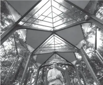  ?? Genaro Molina/los Angeles Times ?? Rev. David Brown stands inside the Wayfarers Chapel in Rancho Palos Verdes. He has launched an appeal on Gofundme to try to raise money that can be used to stabilize the chapel, which sits on an accelerati­ng landslide complex.