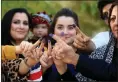  ??  ?? Kurdish voters: Backing a breakup
