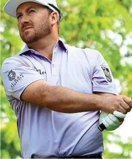  ?? GETTY IMAGES ?? Purple reign: McDowell shoots five-under yesterday