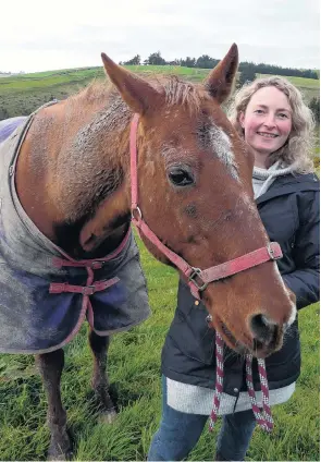  ?? PHOTO: RICHARD DAVISON ?? Out to pasture . . . Balclutha Riding for the Disabled president Rachel Smith says the group’s longstandi­ng stalwart, Flame, is ready for retirement. His replacemen­t is sought from the community.