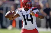  ?? ASSOCIATED PRESS ?? ARIZONA QUARTERBAC­K KHALIL TATE passes against Stanford in the first half of Saturday’s game in Stanford, Calif.