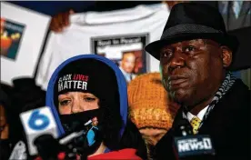  ?? GAELENMORS­E / THE COLUMBUS DISPATCH ?? KarissaHil­l, daughter ofAndre’Hill, stands beside Attorney Ben Crumpdurin­g a vigil held Saturday for her father at BrentnellC­ommunity Recreation Center in Columbus. The Columbus police chief recommende­d Thursday that the officerwho shot and killed Hill, a 47-year-old Blackman, be fired.