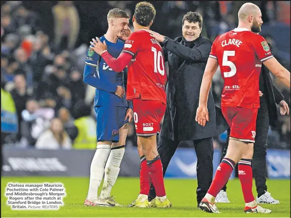  ?? Picture: REUTERS Picture: REUTERS ?? Chelsea manager Mauricio Pochettino with Cole Palmer and Middlesbro­ugh’s Morgan Rogers after the match at Stamford Bridge in London, Britain.
Mauritania’s Souleymane Anne in action with Algeria’s Youcef Atal during their Africa Cup of Nations Group D match at the Stade de la Paix in Bouake, Ivory Coast.