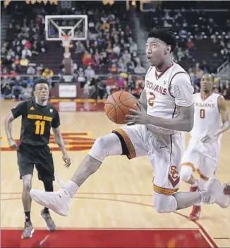  ?? Mark J. Terrill Associated Press ?? JONAH MATHEWS DIDN’T EXPECT to play too much during his freshman season at USC, but since Bennie Boatwright’s injury, Mathews has become the Trojans’ best on-ball defender.