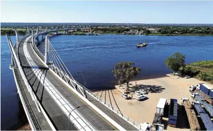  ?? /Getty Images ?? Bridging the Zambezi:
The 923m-long Kazungula Bridge on the Botswana-Zambia border is built over the Zambezi River.