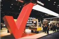  ?? Bloomberg ?? The Verizon Communicat­ions booth at the Mobile World Congress Americas convention this month in Los Angeles. On Oct. 1, Verizon is rolling out its 5G service in four cities with others to follow, offering broadband-like speeds.