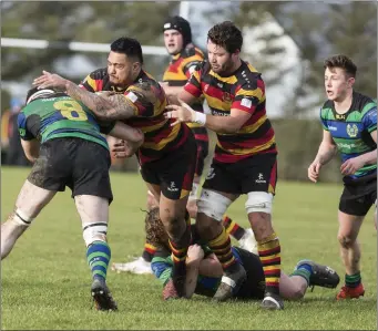  ??  ?? Mata Fifita tackles for Sligo on Saturday against Seapoint. Pics: Donal Hackett.