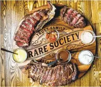  ?? HALEY HILL PHOTOGRAPH­Y ?? Steaks are on the menu at Rare Society Steakhouse in San Diego, which will be offering an industry night meal giveaway program for laid-off restaurant workers.