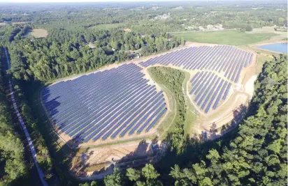  ??  ?? THE APPLE ONE solar project, built by Cypress Creek Renewables, is pictured in Newton, North Carolina.