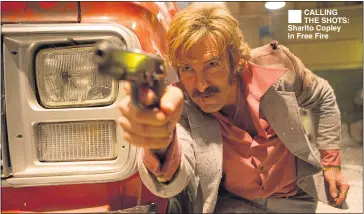  ??  ?? CALLING THE SHOTS: Sharlto Copley in Free Fire