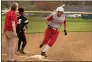  ?? BARRY BOOHER — FOR THE NEWS-HERALD ?? Daliz Alvarez of Geneva makes the turn around third base during her second inning inside-the-park home run on April 9.