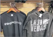  ?? ANITA SNOW / AP ?? T-shirts at McCarran Internatio­nal airport in Las Vegas bear the city’s initial message of unity after the Oct. 1 mass shooting. A new campaign featuring real-life social media posts drew mixed reviews.