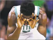  ?? Charles Krupa / Associated Press ?? Jaylen Brown reacts after hitting a 3-pointer against Philadelph­ia on Wednesday.