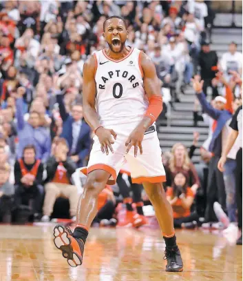  ?? PHOTO AFP ?? C.J. Miles célèbre un panier de trois points qui a permis aux Raptors de Toronto d’avoir l’avantage sur les Wizards de Washington, dans le match no 1 de la série, hier.