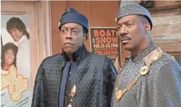  ?? PROVIDED BY QUANTRELL D. COLBERT ?? Arsenio Hall, left, and Eddie Murphy reprise their roles as Semmi and Prince Akeem in “Coming 2 America.”