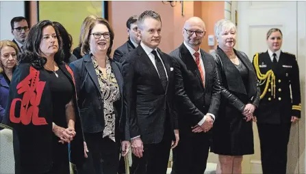  ?? SEAN KILPATRICK THE CANADIAN PRESS ?? Veterans Affairs Minister Jody Wilson-Raybould, left, Treasury Board President Jane Philpott, Indigenous Services Minister Seamus O’Regan, Justice Minister David Lametti and Minister of Rural Economic Developmen­t Bernadette Jordan attend a swearing-in ceremony at Rideau Hall.