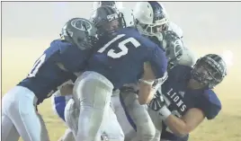  ?? Jeremy Stewart / RN-T ?? Several Unity defenders swarm around Central Christian’s Mike Bell Jr. during Friday’s game.