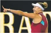  ?? Simon Baker Associated Press ?? AMANDA ANISIMOVA celebrates after her thirdround win over defending champion Naomi Osaka.