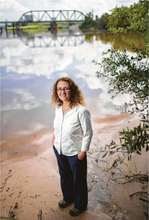  ??  ?? Sarah P. Bernhardt, president and CEO of the Bayou Preservati­on Associatio­n, is leading efforts to ensure the bayou system remains healthy. Marie D. De Jesús / Staff photograph­er