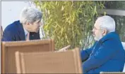  ?? Susan Walsh
AFP/Getty Images ?? JOHN F. KERRY with Iranian Foreign Minister Mohammad Javad Zarif late last month in Geneva.