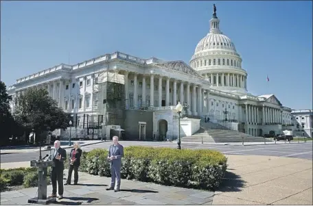  ?? Patrick Semansky Associated Press ?? HOUSE MINORITY WHIP Steve Scalise of Louisiana, at lectern, with fellow Republican House members last month on Capitol Hill.