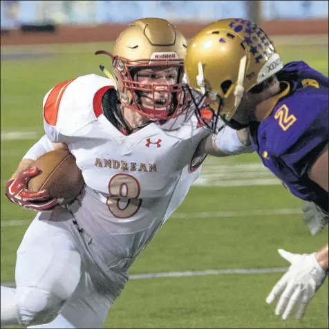  ?? MICHAEL GARD/POST-TRIBUNE ?? Andrean’s Ryan Walsh, left, tries to get past Hobart’s Matthew Benton in 2018.