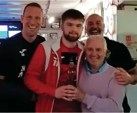  ?? Picture: Cadbury Heath FC ?? Cadbury Heath’s Ewen McMillan receives his man of the match award after Wednesday night’s 2-1 win against Keynsham Town in the Les Phillips Cup semi-final at Springfiel­d