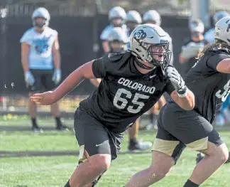  ?? Daily Camera ?? Colby Pursell is slated to start at center for the Buffs when the 2020 season starts.
