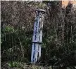  ?? Andriy Andriyenko/Associated Press ?? A missile sticks out in a residentia­l area Saturday in the village of Bohorodych­ne.