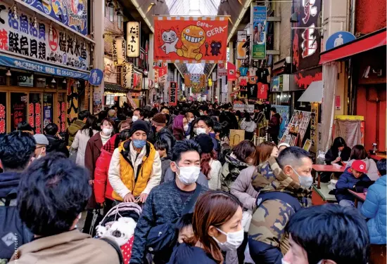  ?? ?? ECONOMIC BOOST
Shinsaibas­hi shopping district in Osaka. Kishida hopes his policies will increase disposable income, consumptio­n and investment.