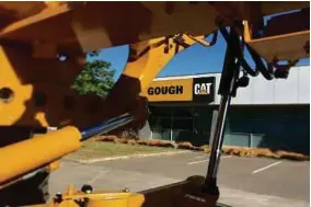  ??  ?? Gough Group mempunyai Caterpilla­r di New Zealand. hak pengedaran bersama perkhidmat­an