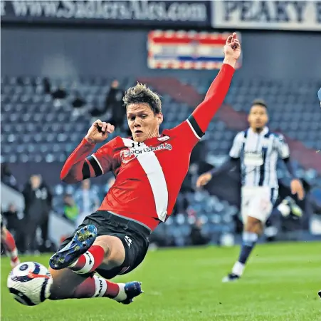  ??  ?? Final flourish: Callum Robinson scores West Brom’s third goal against Southampto­n