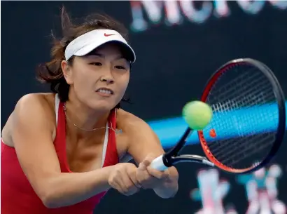  ?? AP ?? Peng Shuai hits a return shot against Venus Williams during their women’s singles match at the China Open on Monday.