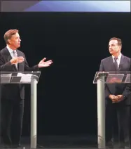 ?? Christian Abraham / Hearst Connecticu­t Media ?? Ned Lamont, left, speaks as he takes part with Bridgeport Mayor Joe Ganim in the first Democratic debate for governor at the Shubert Theatre in New Haven Thursday.