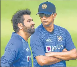  ?? PTI ?? India head coach Rahul Dravid (R) is helming the transition of an ageing team.