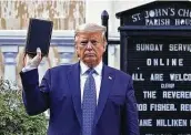  ?? Brendan Smialowski / AFP / Getty Images ?? Joe Biden falsely claimed that President Donald Trump held the Bible upside down in June.