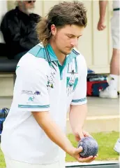  ?? ?? Above: Yarragon second Ethan Storer concentrat­es before bowling against Newborough on Saturday. Ethan’s rink enjoyed a comfortabl­e 40/9 win.