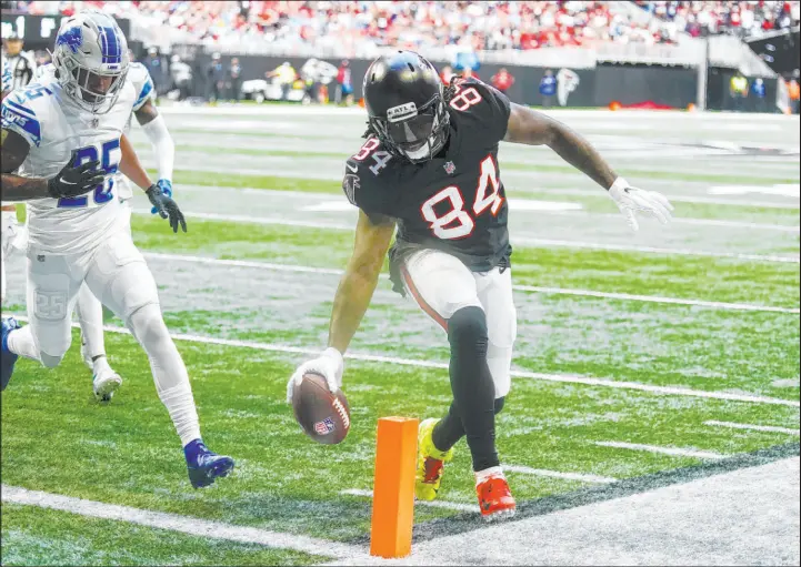  ?? John Bazemore The Associated Press ?? Cordarrell­e Patterson of the Atlanta Falcons scores a touchdown against the Detroit Lions on Dec. 26. Patterson was a dual-threat running back and receiver this season.