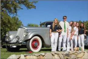  ?? COURTESY PHOTOGRAPH­S BY KIMBALL STUDIOS ?? 4-H students pose for a photo with one of the classic cars at the Ironstone Concours d’Elegance.